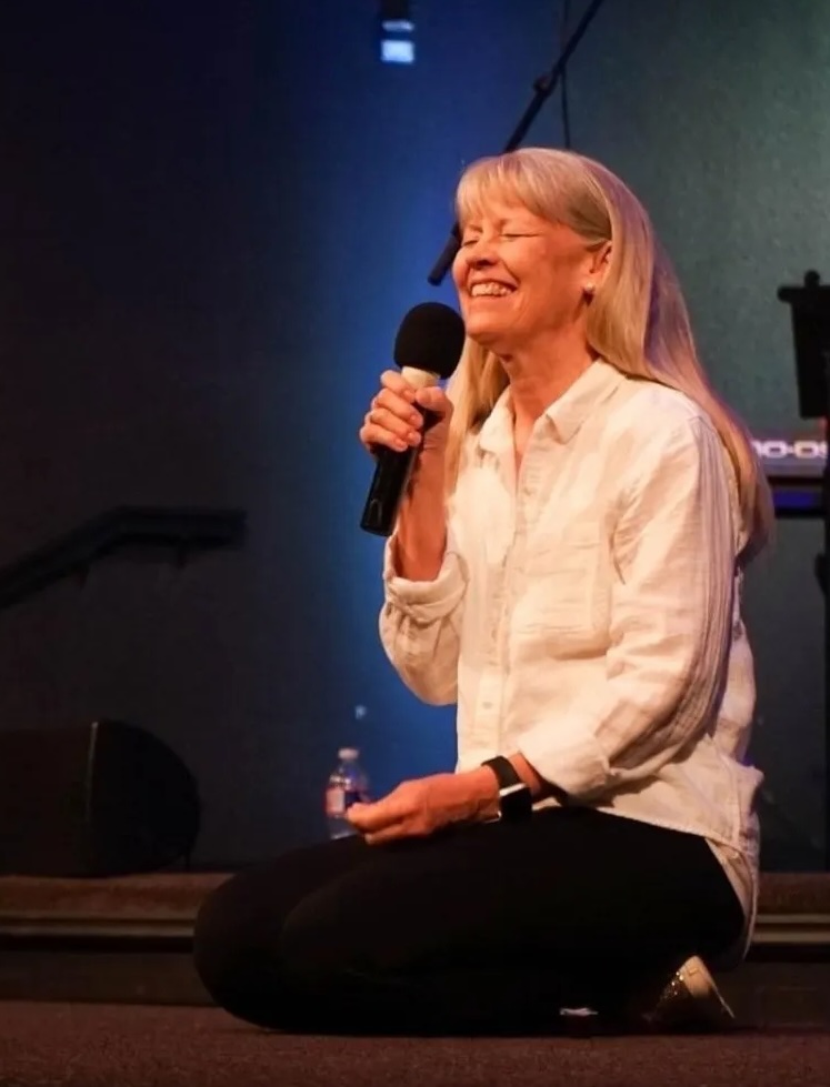 Marci speaking